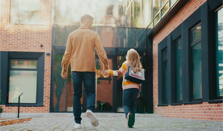 A father and daughter symbolize child custody agreements.