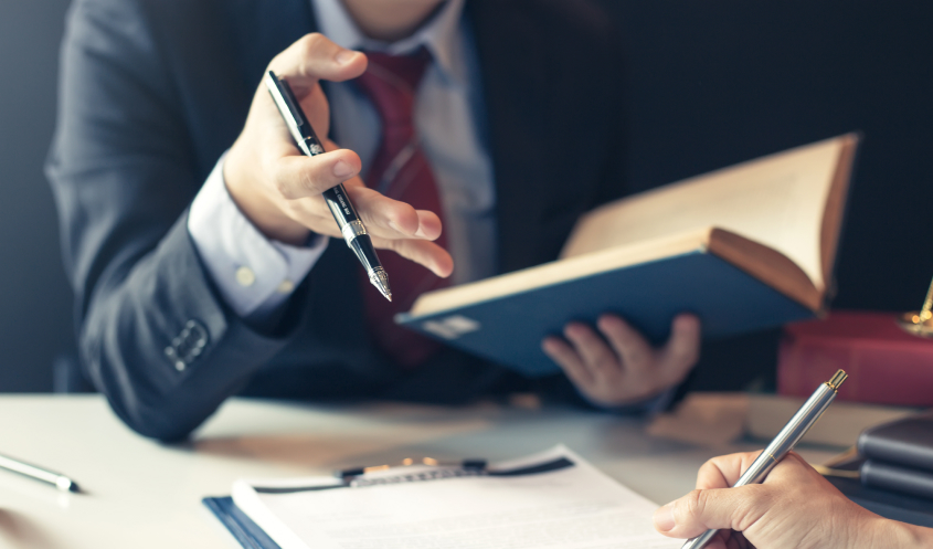 An estate planning attorney meets with a family.