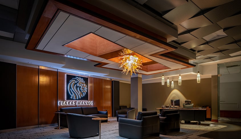 A snapshot inside Plakas Mannos, illustrating why law clerks want to work there.