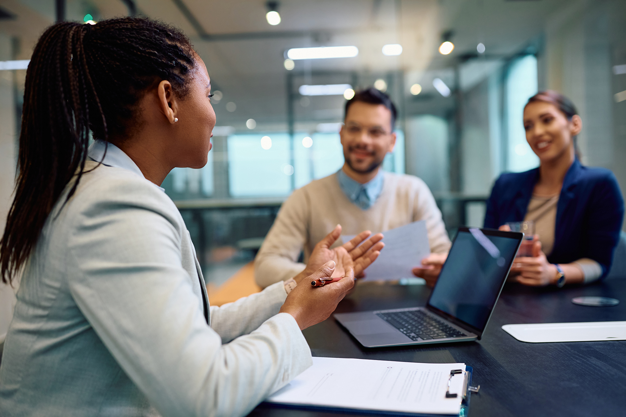 Attorney discussing intellectual property with a husband and wife