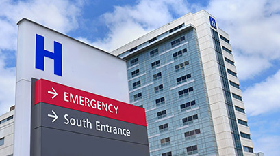 Hospital's emergency department sign and building