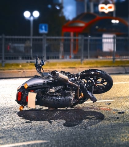 Motorcycle lying on the ground after a motorcycle accident